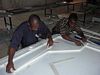 Custom cultured marble vanity top on wall panel mold