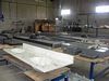 Double Bowl Vanity Top. Factory layout in background